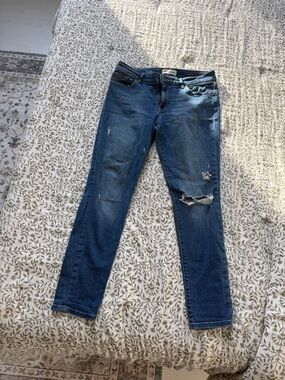 DL1961 Distressed Mid Blue Skinny Jeans